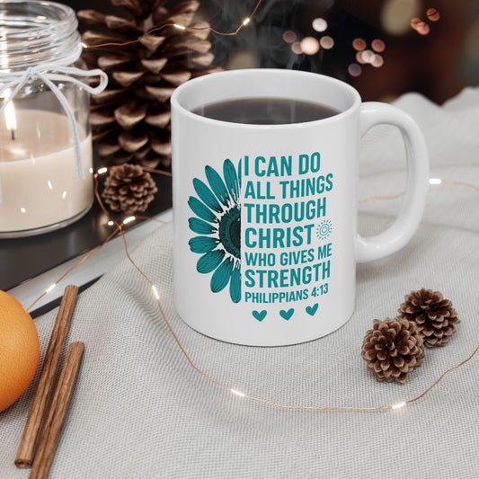 Inspirational mug with floral design on a cozy desk with notebook and flowers